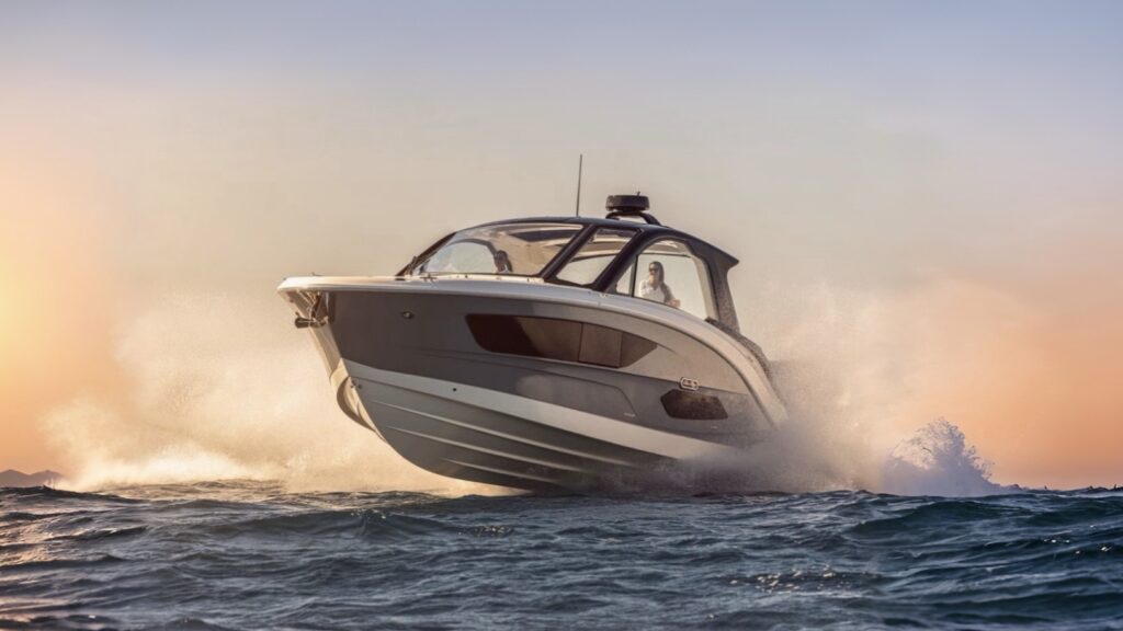 Image of a Sea Ray motorboat with two people inside, leaping over waves at high speed during sunset. The boat is captured mid-air with water splashing, creating a dynamic and thrilling scene against the backdrop of a fading sky.