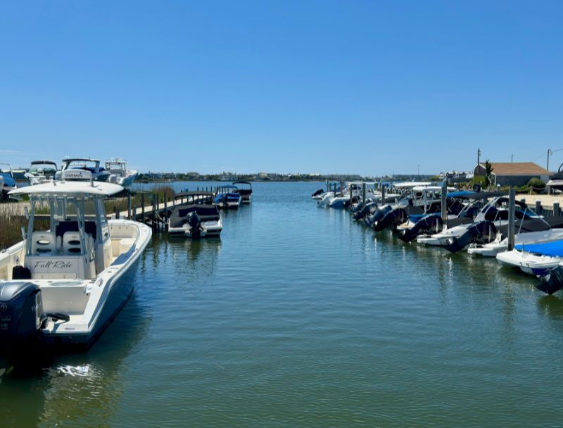 View down the Westhampton waterway with boats docked on both sides