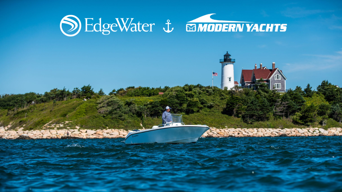 EdgeWater center console boat on open water with lighthouse in the background