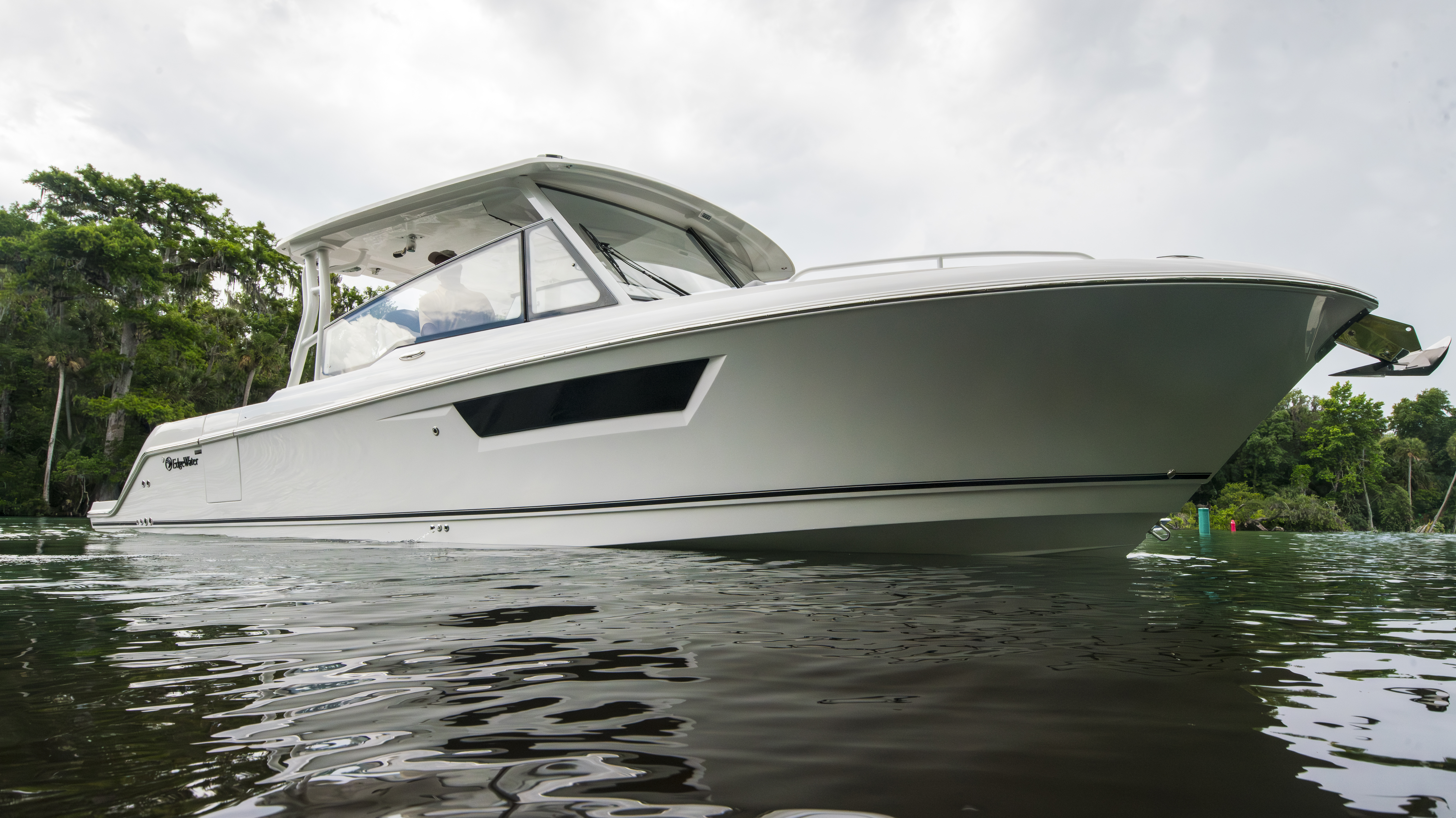 Edgewater 310SC luxury side console boat on the water