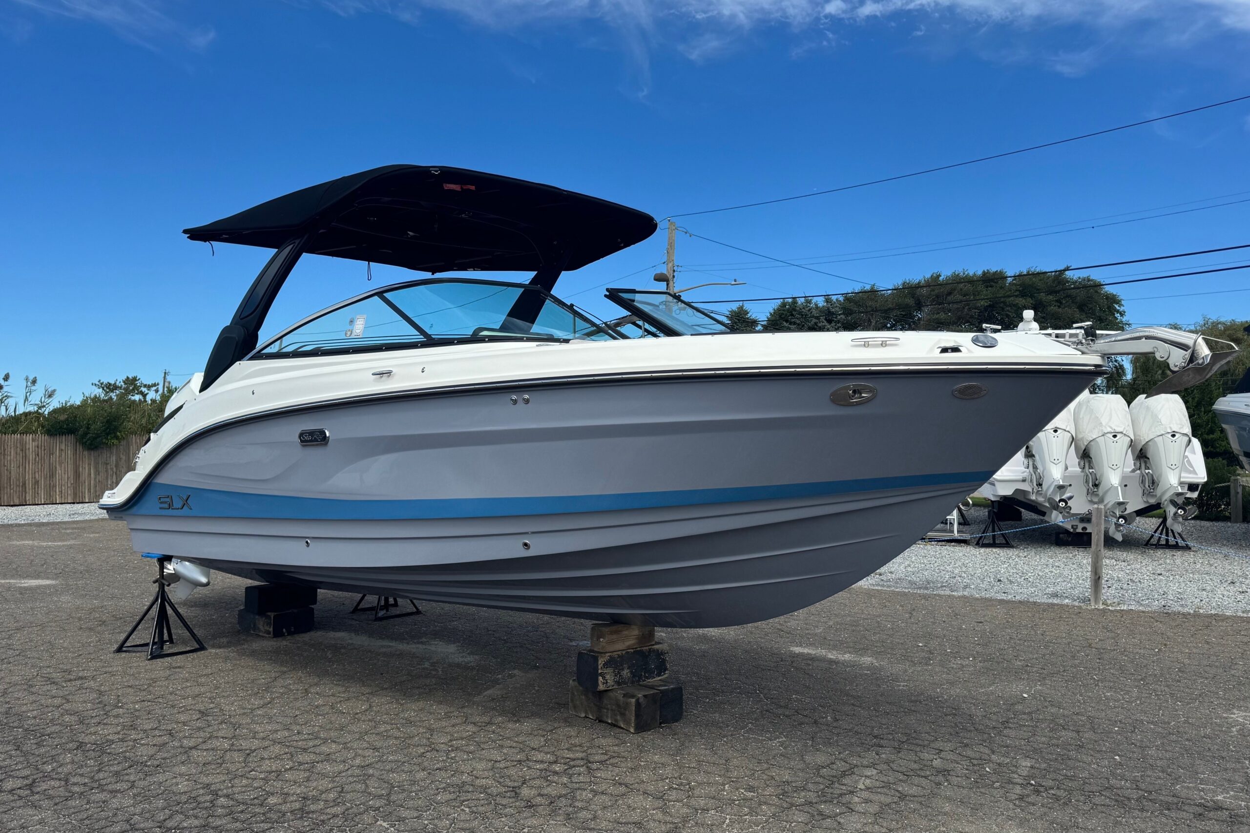 2027 Sea Ray SLX 260 Outboard with gray hull, featured in the Show Stopping Deals Sales Event at Modern Yachts.